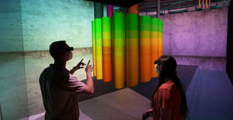 Students Cole Manfred (at left) and Emily Meilus inspect a virtual nuclear reactor using the RAPID system.