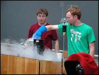 Justin W. and Justin B. presenting using liquid nitrogen during an explanation of some modern physics demos