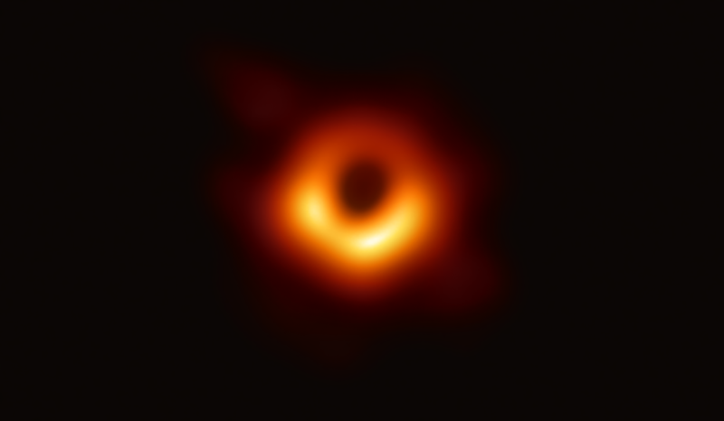 The first image of a black hole taken by the Event Horizon Telescope released in April 2019..